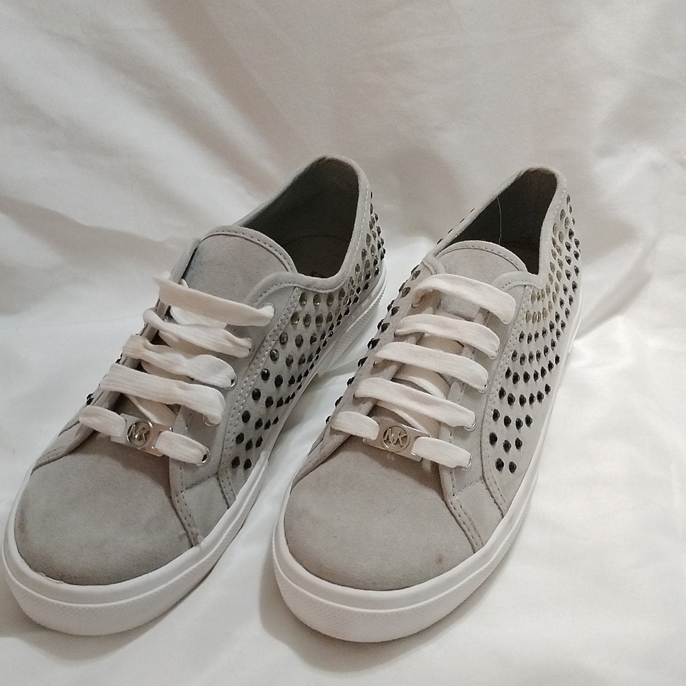 Ladies Michael Kors canvas shoe size 4. Gray Color with